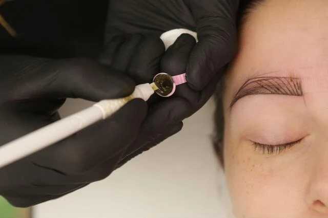 Brow embroidery procedure with pigment ring and sterile handpiece