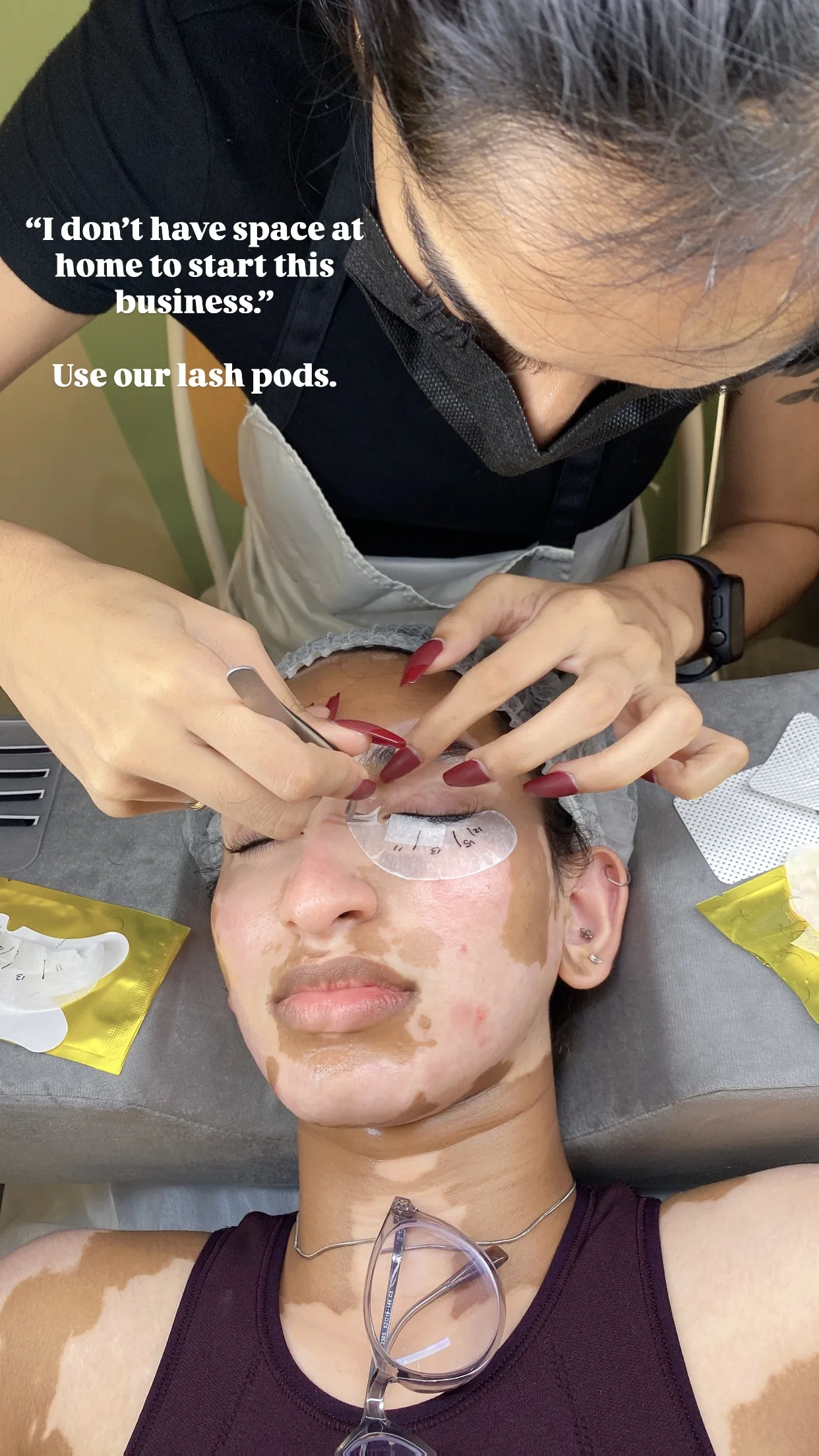Graduate serving a client in a Jealash Lash Pod