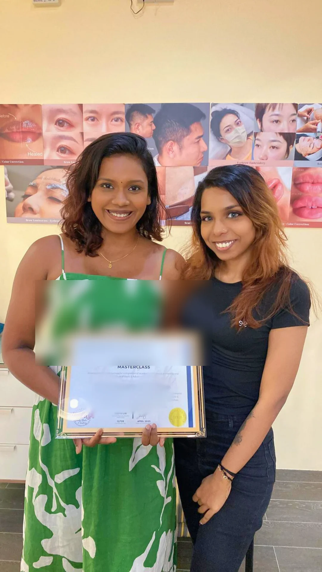 Jealash graduate holding a privacy-blurred course completion certificate