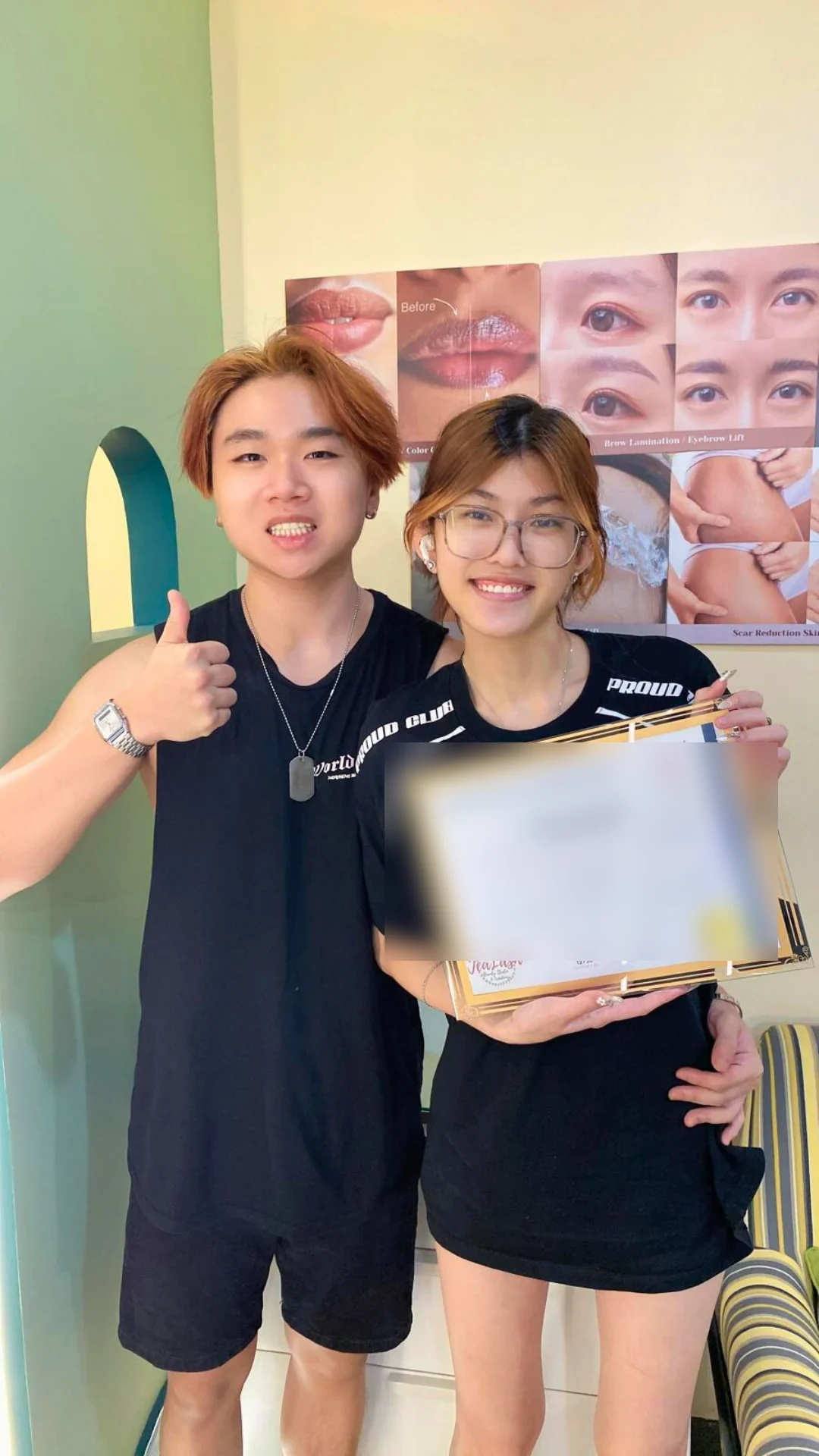 Jealash graduate holding a privacy-blurred course completion certificate
