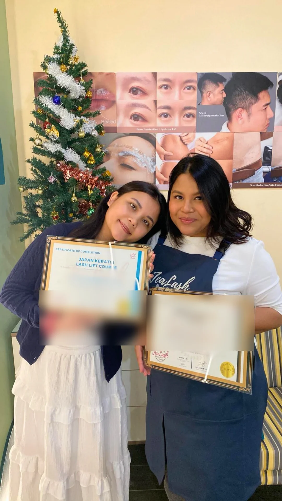 Jealash graduate holding a privacy-blurred course completion certificate